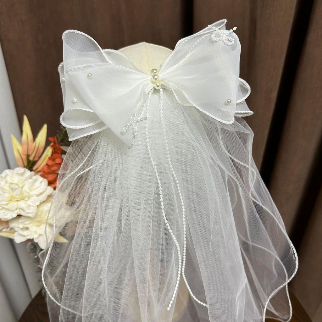 Вуаль с бантом из двухслойного тюля для девочки