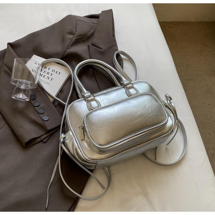 Рюкзак Женский рюкзак 2025 Новый Большая вместимость Нишевый Простой Городской Колледж Колледжный стиль Кожаная школьная сумка