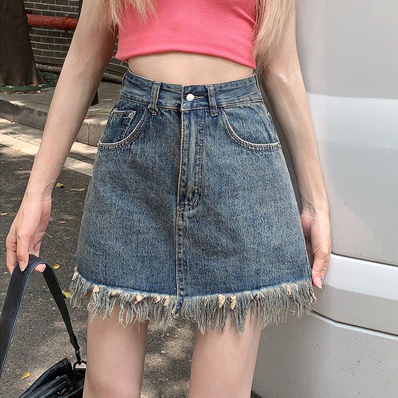 Классическая универсальная молодежная износостойкая юбка Полувинтажная юбка А-силуэта с принтом в виде талии Юбка с кисточками Необработанный край Женская летняя модная джинсовая короткая юбка