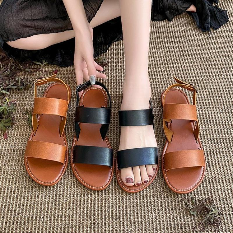 Женские сандалии на плоской подошве 2024 года, новые кожаные с перекрестными ремешками из Европы и Америки, высококачественные летние женские туфли, пляжные сандалии с пряжкой и ремешком