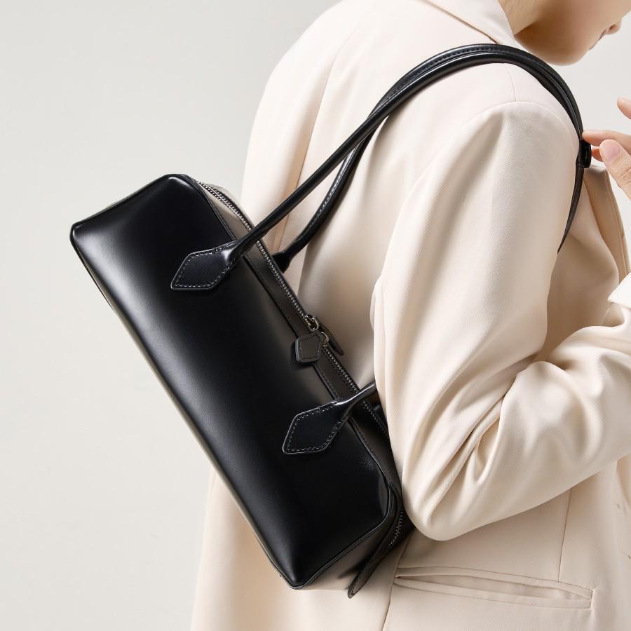 2025 Нишевая сумка из коровьей кожи: Универсальная, вместительная сумка подмышку и для поездок на работу для женщин