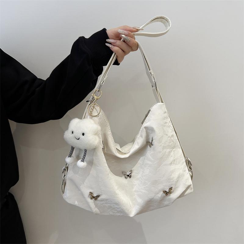 Мягкая кожа бабочка большая вместимость высокая ценность нежная наплечная сумка 2025 лето новая женская наплечная сумка-мессенджер тоут