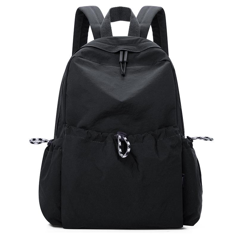 Корейский женский нейлоновый рюкзак весна-лето 2025: Модный однотонный повседневный школьный ранец для студентов