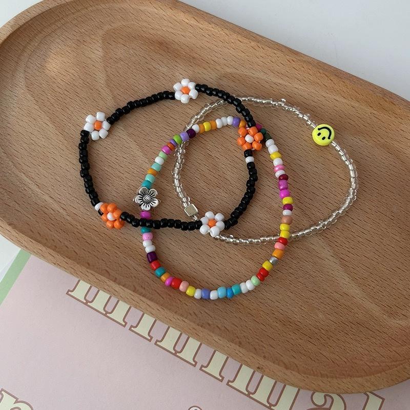 Браслет из бисера «Цветок-смайлик»