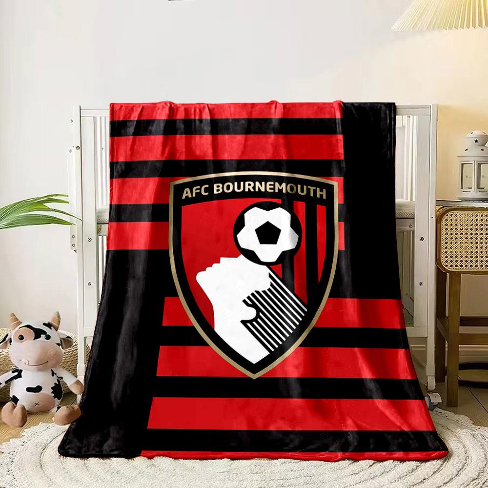 Red and black stripes background with a shield featuring a soccer emblem. for all seasons blanket lunch break throw gift