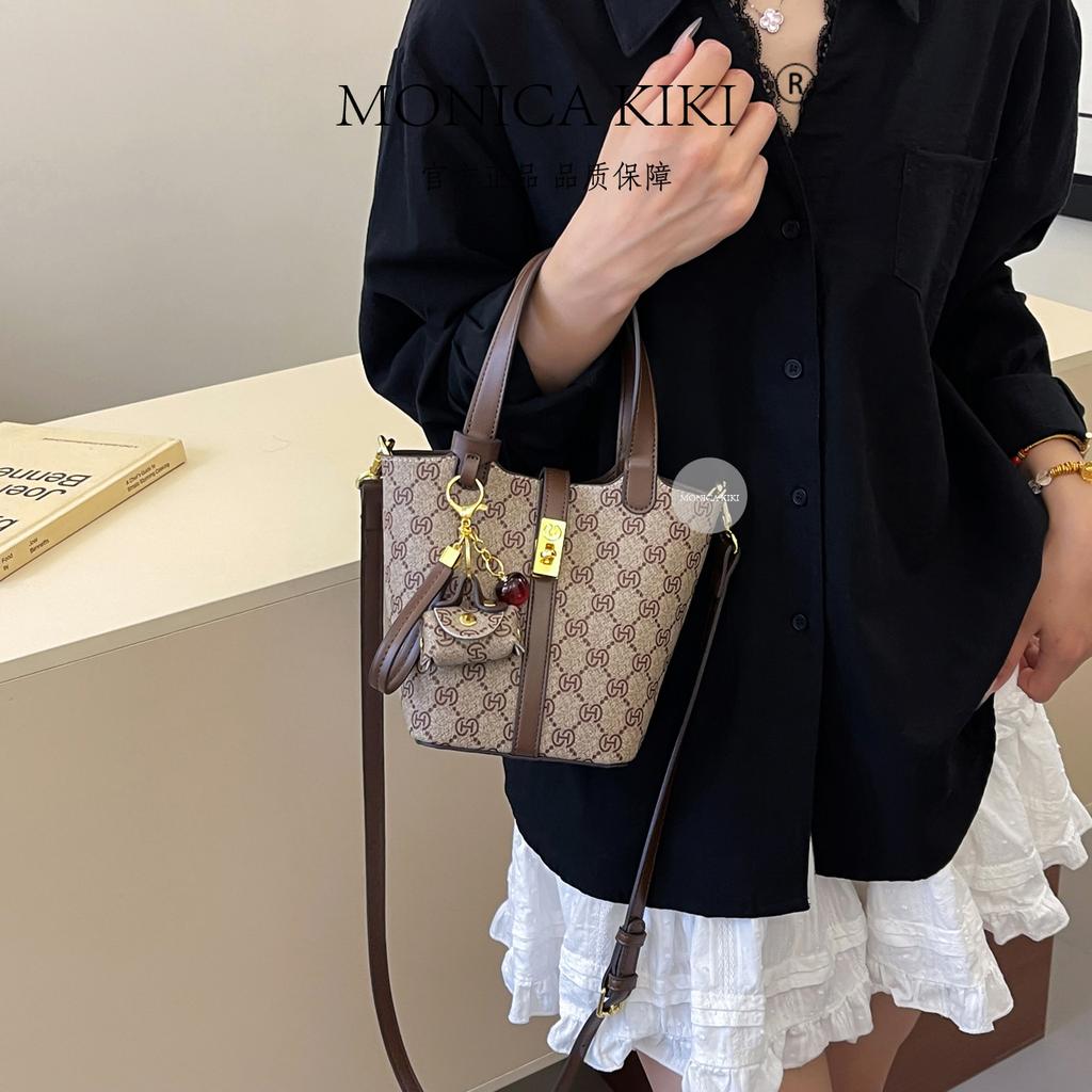 European and American trendy high-end sense retro printing portable bucket bag women's 2025 new large-capacity fashion versatile messenger bag