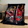 Fiery red demon masks split by swords, surrounded by ornate golden designs. for all seasons blanket lunch break throw gift