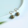 Wooden earrings made of green sandalwood, natural agarwood, and wood, with hook-shaped sandalwood pendants, in a new Chinese style