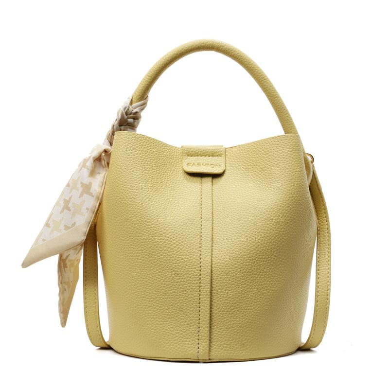 Korean fashion and simplicity Ou Ruofeng casual versatile portable bucket bag women's commuting advanced sense messenger child and mother bag