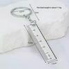 Брелок-линейка из нержавеющей стали - Компактный измерительный инструмент для школьных и офисных принадлежностей (Рулетка с защитой от потери)