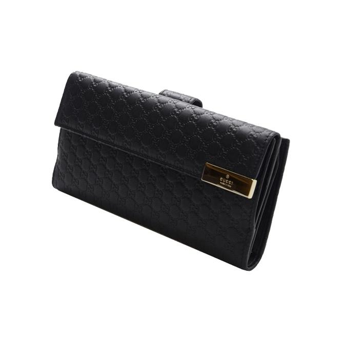 Gucci Длинный бифолд кошелек из тисненой кожи GG черного цвета для унисекс на каждый день