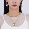 2025 New Personalized High End Sweet Cool Style Two Tone Alloy Peach Heart Pendant Necklace Earring Set for Women