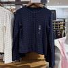 Женский фактурный вязаный кардиган в рубчик из жаккарда с длинными рукавами и круглым вырезом