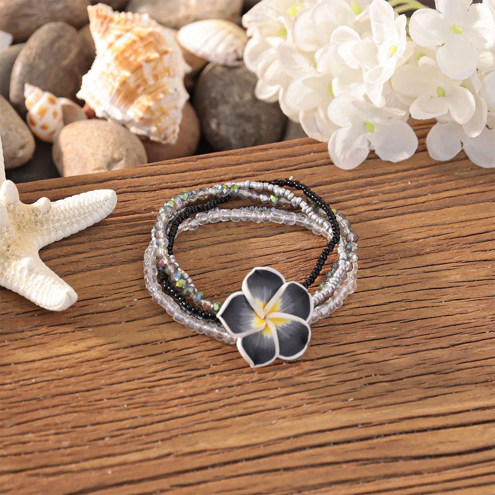 Bohemian vacation style egg flower necklace earrings set ins niche flower soft pottery color collarbone chain tide