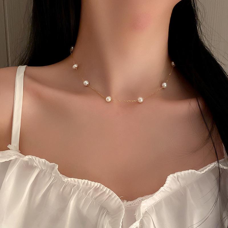 Korean temperament love butterfly pearl fringed necklace fashion collarbone chain versatile item decoration