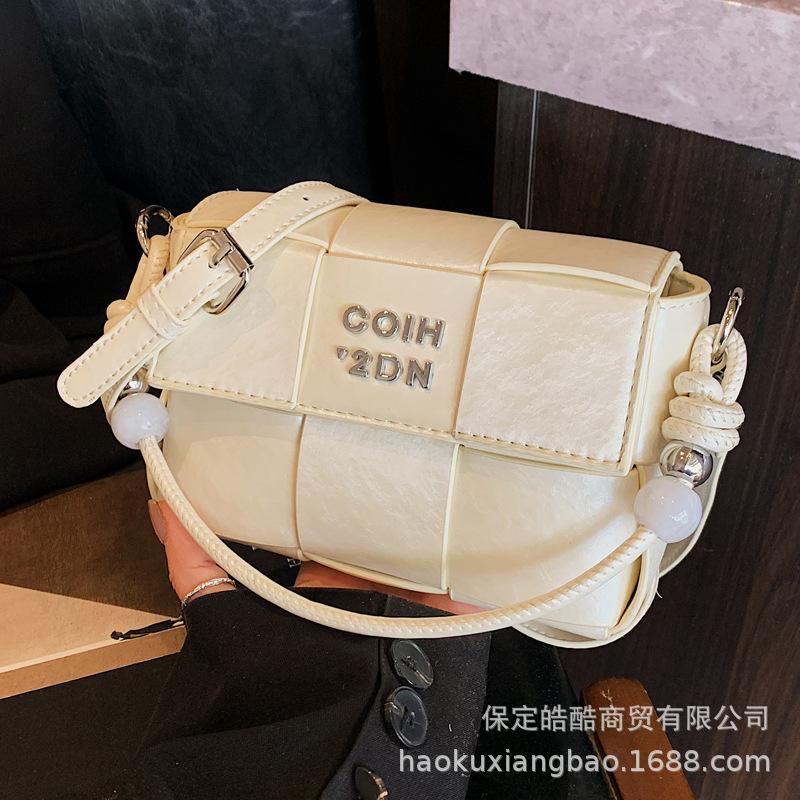 High-end niche bag women's spring and summer 2025 new fashion shoulder messenger bag Korean version women's woven small square bag