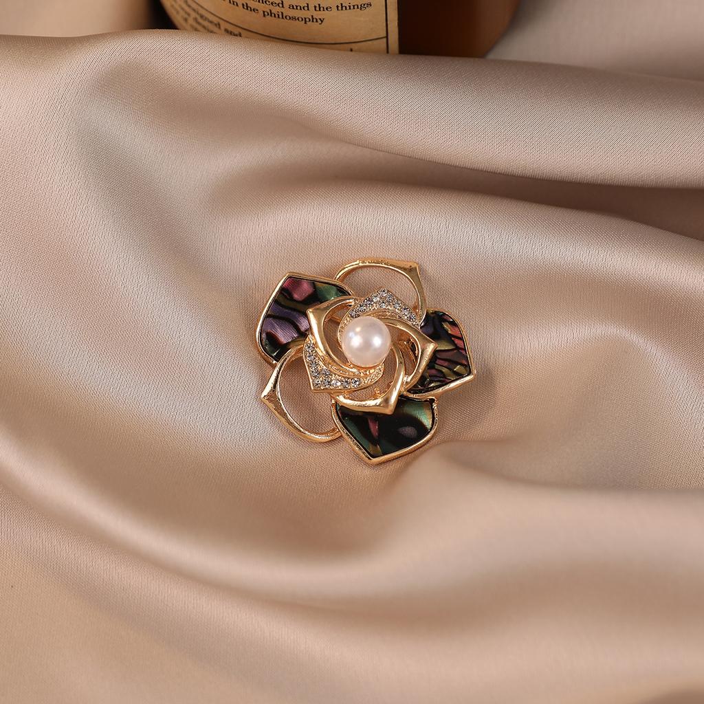 A Delicate Pearl Garland Brooch with A Little Design Elegant and Fashionable for Women and A Sweet New Camellia Corch
