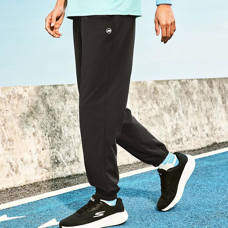 Skechers Логотип Godri Удобные Влагоотводящие Быстросохнущие Тканые Повседневные Брюки Мужские Брюки Угольно-Черные P225M104-0018
