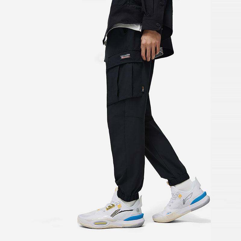 Li-Ning Wade Series Solid Color Tapered Multi-Pocket Woven Knit Sports Pants Men Pants Black AYKU013-1