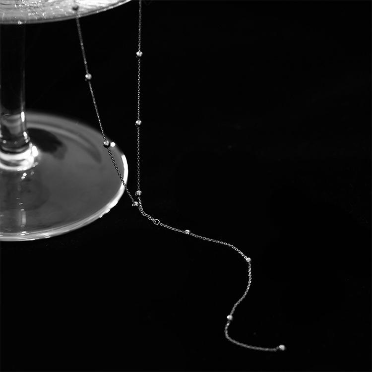 Серебряное ожерелье с кисточками S925: Женский летний стиль - Простая, шикарная цепочка на ключицы с легкой роскошью и нишевым дизайном.