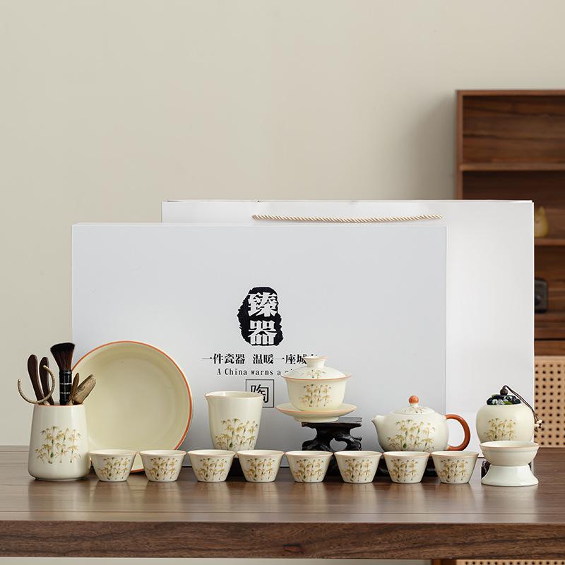 Enterprise high-end Zhenqi gift box, a complete set of tea trays, Kung Fu tea sets, Ru kiln new Chinese gold silk business souvenir