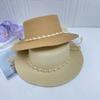 French retro pearl strap flat top straw hat women's summer vacation sunshade wide brim hat fashionable and elegant top hat