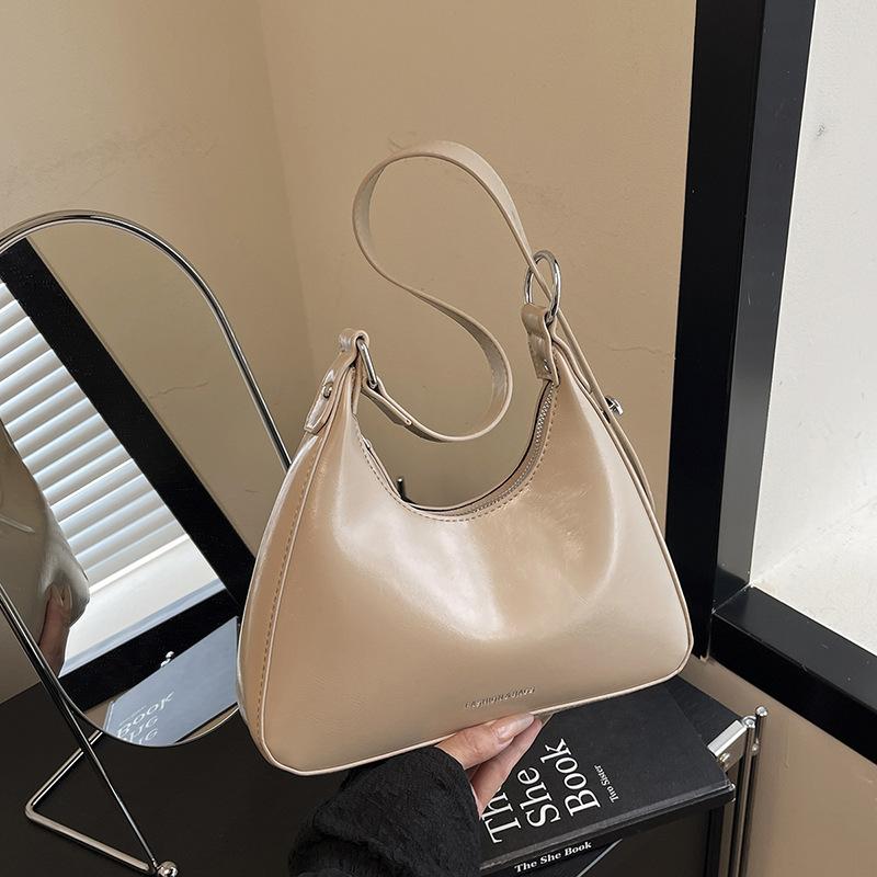 Сумка подмышку женская 2025 новая высококлассная женская модная универсальная нишевая дизайнерская плечевая сумка