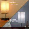 This stylish, Japanese-style LED desk lamp features a zipper switch for indirect lighting, creating a relaxing atmosphere in the living room,