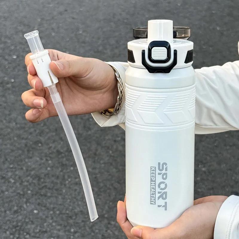 650ml stainless steel insulated bottle with handle, dual drinking lid design, fashion vacuum thermos for outdoor travel sports