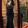 Женский костюм в корейском стиле: топ с длинным рукавом и французским узлом и юбка-рыбка - Облегающий, стильный наряд