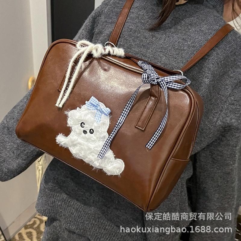 Retro small bag women's casual fashion niche design backpack Korean version casual schoolbag lightweight travel small backpack