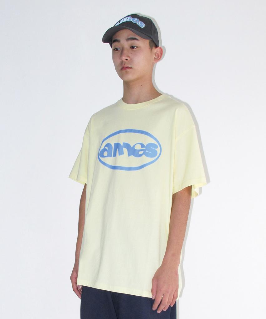 AMES-WORLDWIDE Ames Circle Logo Symbol Tee Yellow
