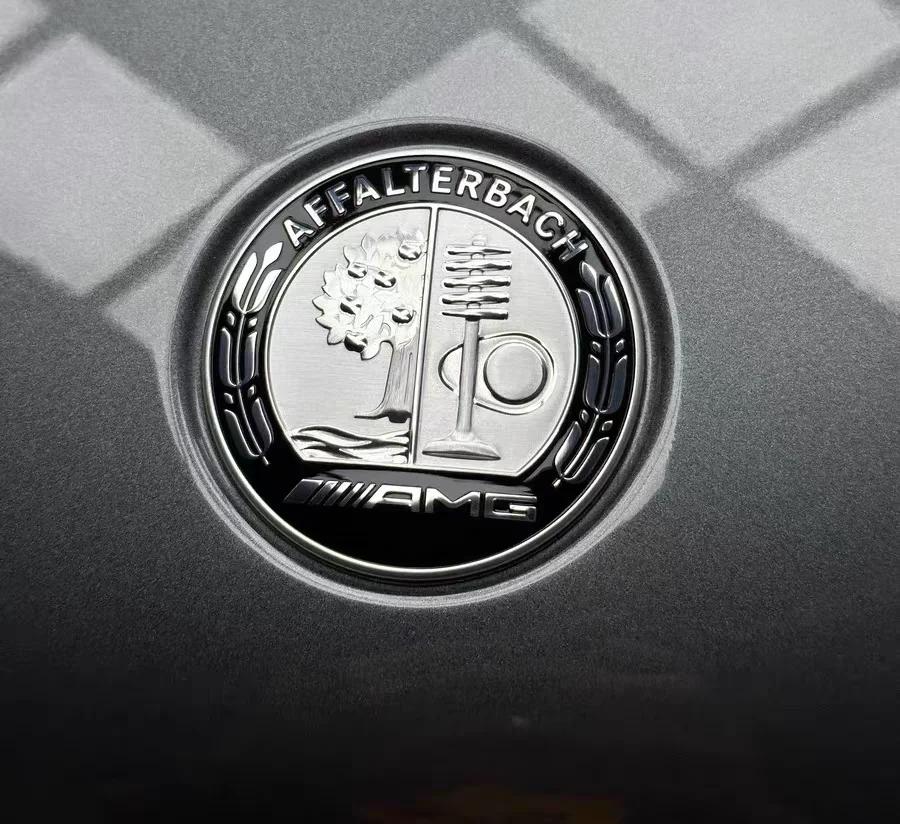 A0008170708 Серебристая эмблема на капот 2 штифта 57 мм Эмблема капота для AMG Mercedes Benz Класс W206 S206 CLA A35 A45 CLS Наклейка на капот