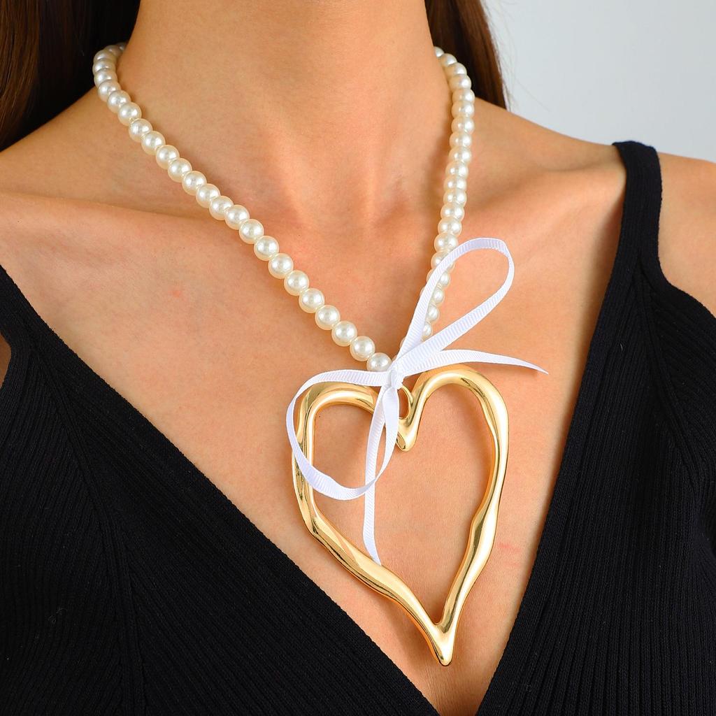 European-American Geometric Irregular Heart Hollow Pendant Oval Wax Rope Necklace