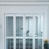 Operable Folding Louvered Door with Solid Wood Blinds