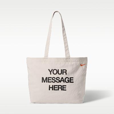 Унисекс сумка-тоут Nike Heritage 22 л "Ваше сообщение здесь" 'Овсяный/Безопасный оранжевый/Безопасный оранжевый'