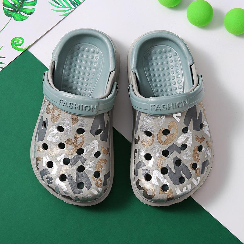 Детские тапочки мужские летние для девочек ощущение наступания на дерьмо сумка голова мягкая подошва нескользящие женские туфли с отверстиями сокровище детские сандалии мальчики носят на улице