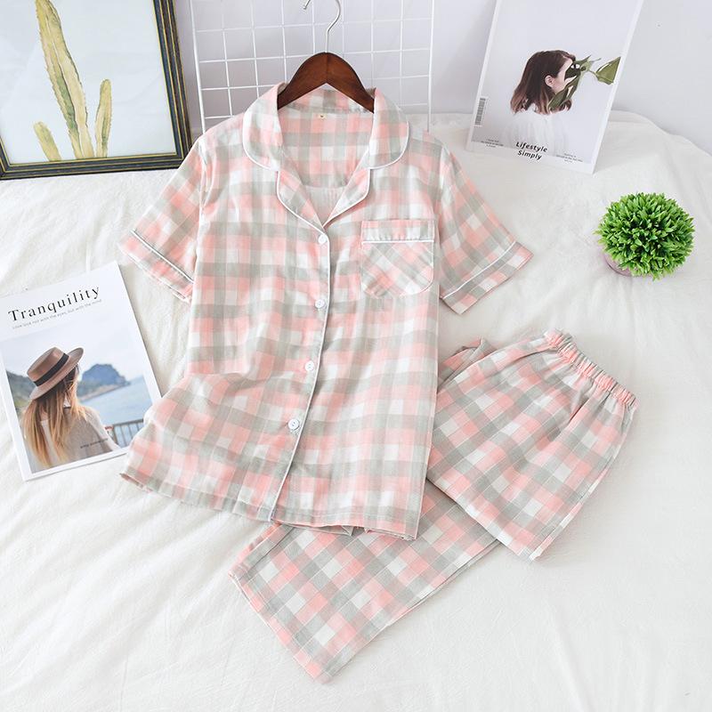 Spring and autumn new couple pajamas women's short-sleeved trousers men's cardigan plaid simple and sweet loose Korean version of loungewear
