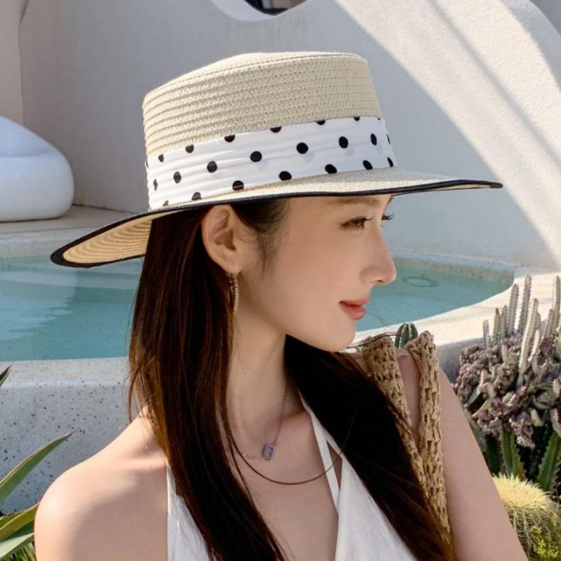 Seaside holiday wind woven hat female high sense Hepburn wind polka dot straw hat casual versatile film hat female