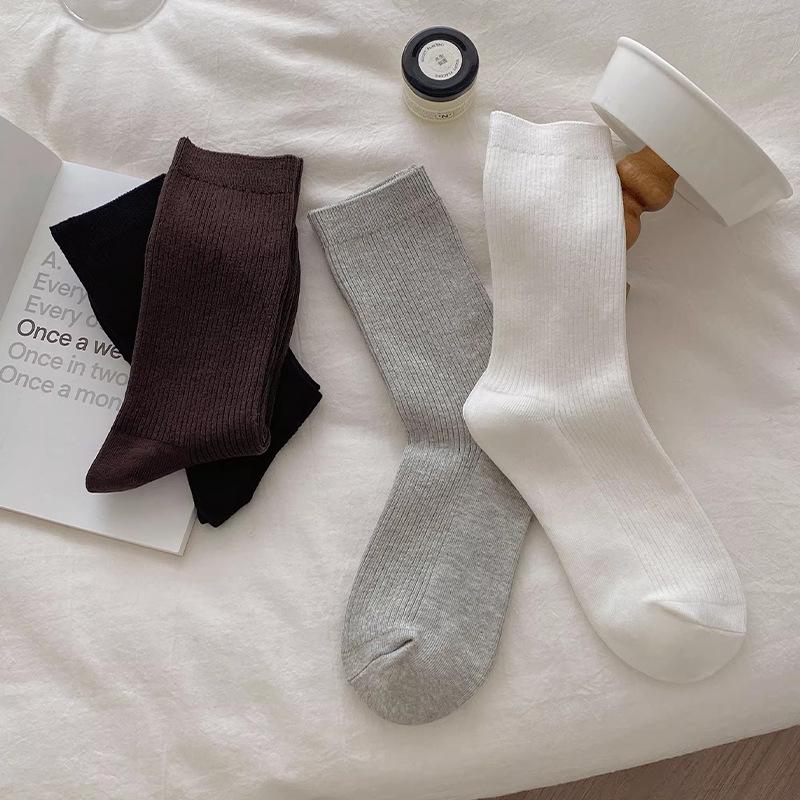 Women's Mid-Calf Slimming Pile Socks: Vertical Stripes, Loose Cuff, Breathable, Anti-Pilling, Double-Needle Finish.