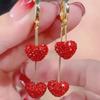 Elegant Red Heart Tassel Earrings: Slim, Sweet, and Stylish for a Round Face.