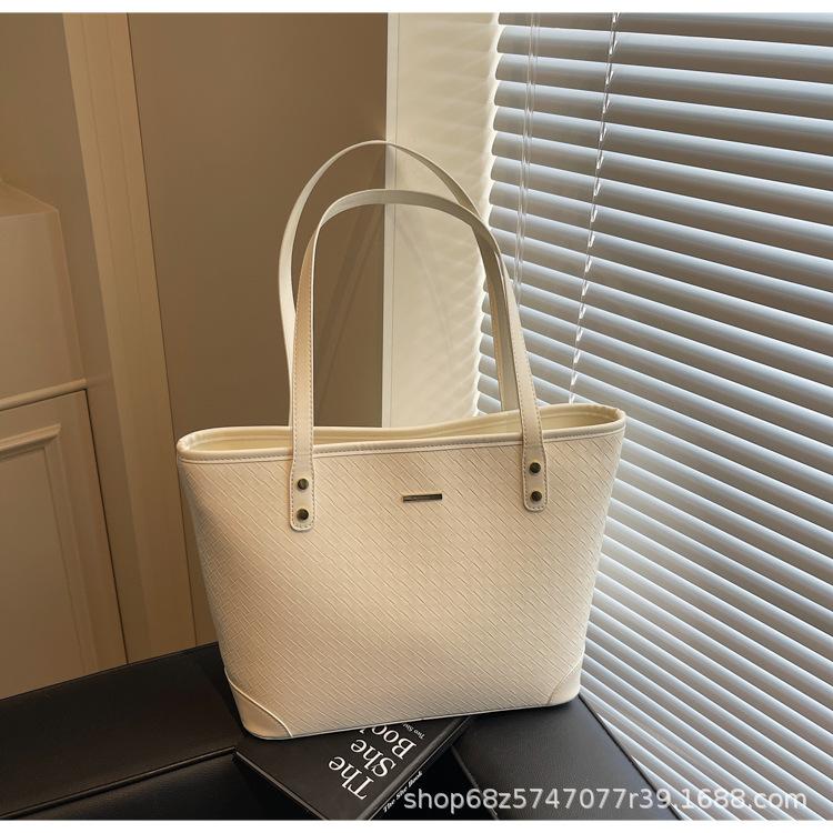Large-capacity commuter tote bag women's Korean version fashion shoulder bag 2025 new versatile niche simple casual women's bag