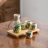 Japanese-style Ceramic Sake Set With A Bottle And Sake Cups Suitable For Serving Hot Or Cold Sake In Homes Or Restaurants.