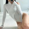 European and American Sexy Spicy Girl Design with Irregular Off Shoulder High Neck Long Sleeved Solid Color Jumpsuit