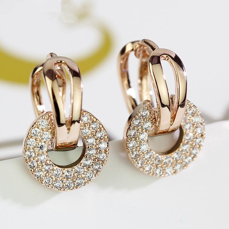 2026 high-end fashion Korean version women's round micro-inlaid zircon ear buckle versatile earrings silver design ear jewelry