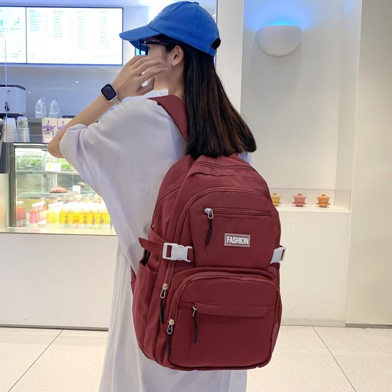 IELGY Korean Version of the Casual Large-capacity Backpack Female Simple Primary School Junior High School Student Bag