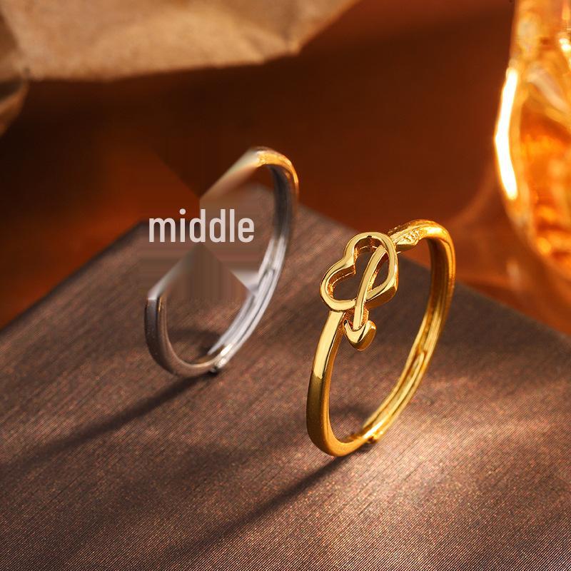 Exquisite New Year Style Hollow Heart Ring: Trendy Woman's Design with Arrow Through the Heart.
