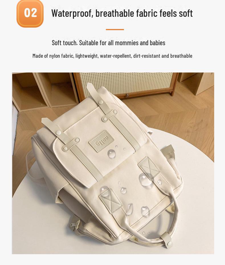 Stylish Mommy Bag: Hand-held Baby & Mother Backpack for Light Travel