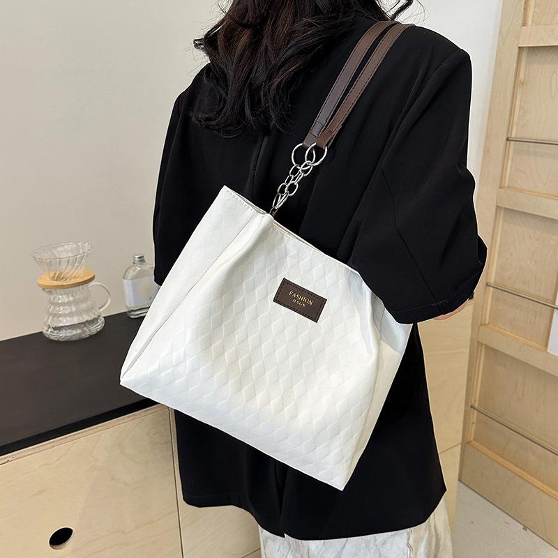 Новые женские модные повседневные сумки-тоуты с высококлассной текстурой для деловых поездок, универсальная сумка через плечо большой вместимости однотонного цвета CLE