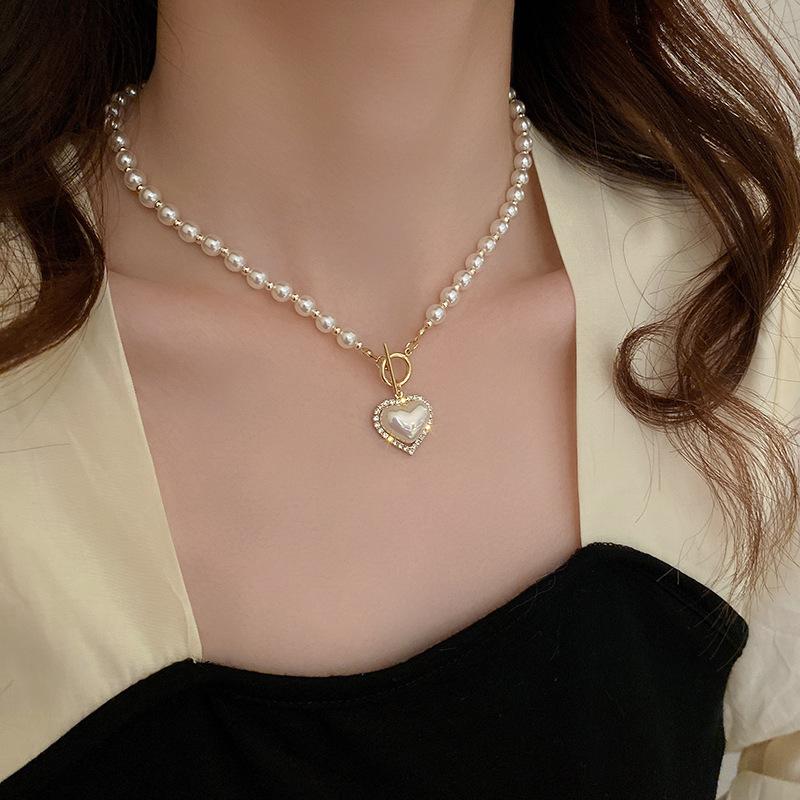 Korean temperament love butterfly pearl fringed necklace fashion collarbone chain versatile item decoration